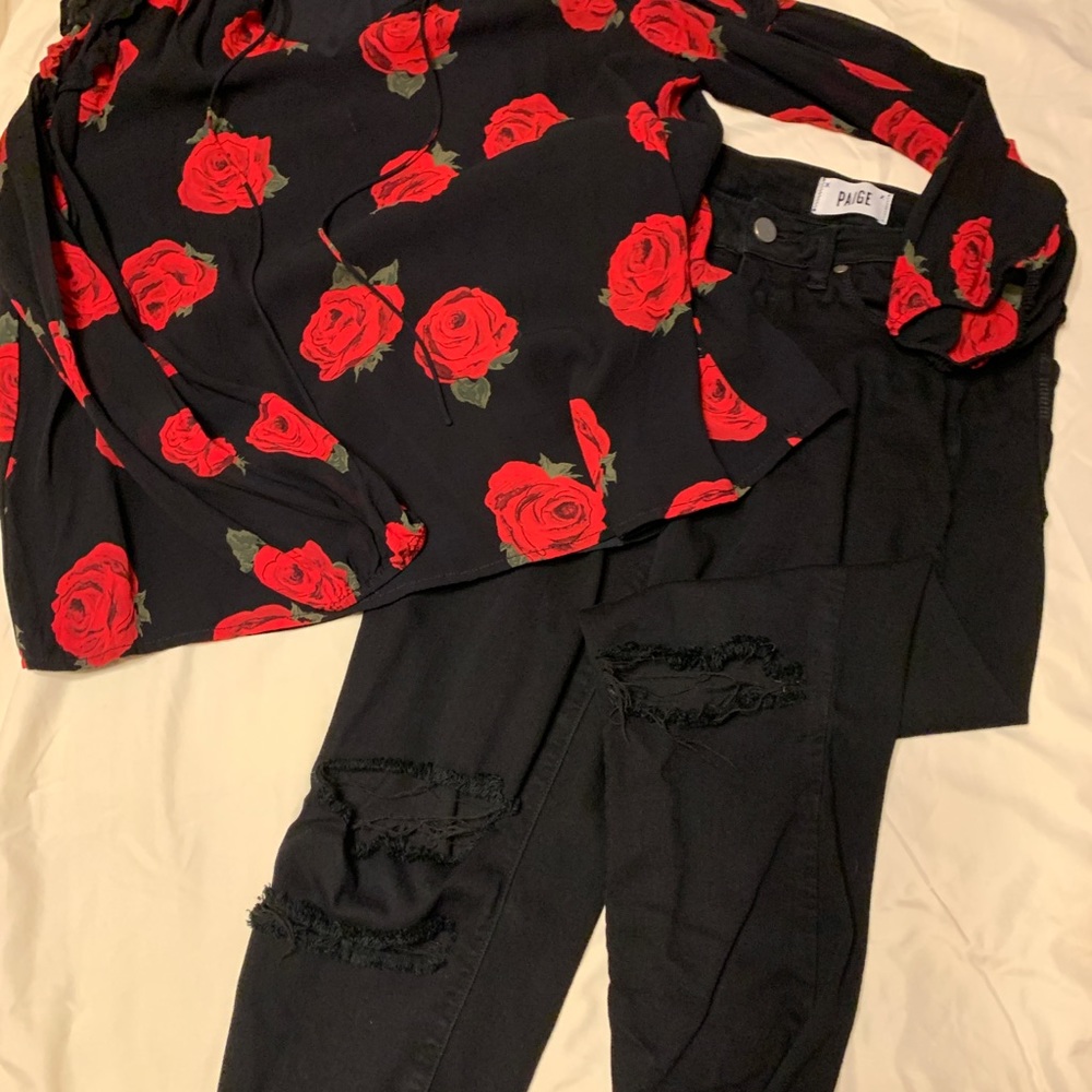 Black jeans with ripped knees